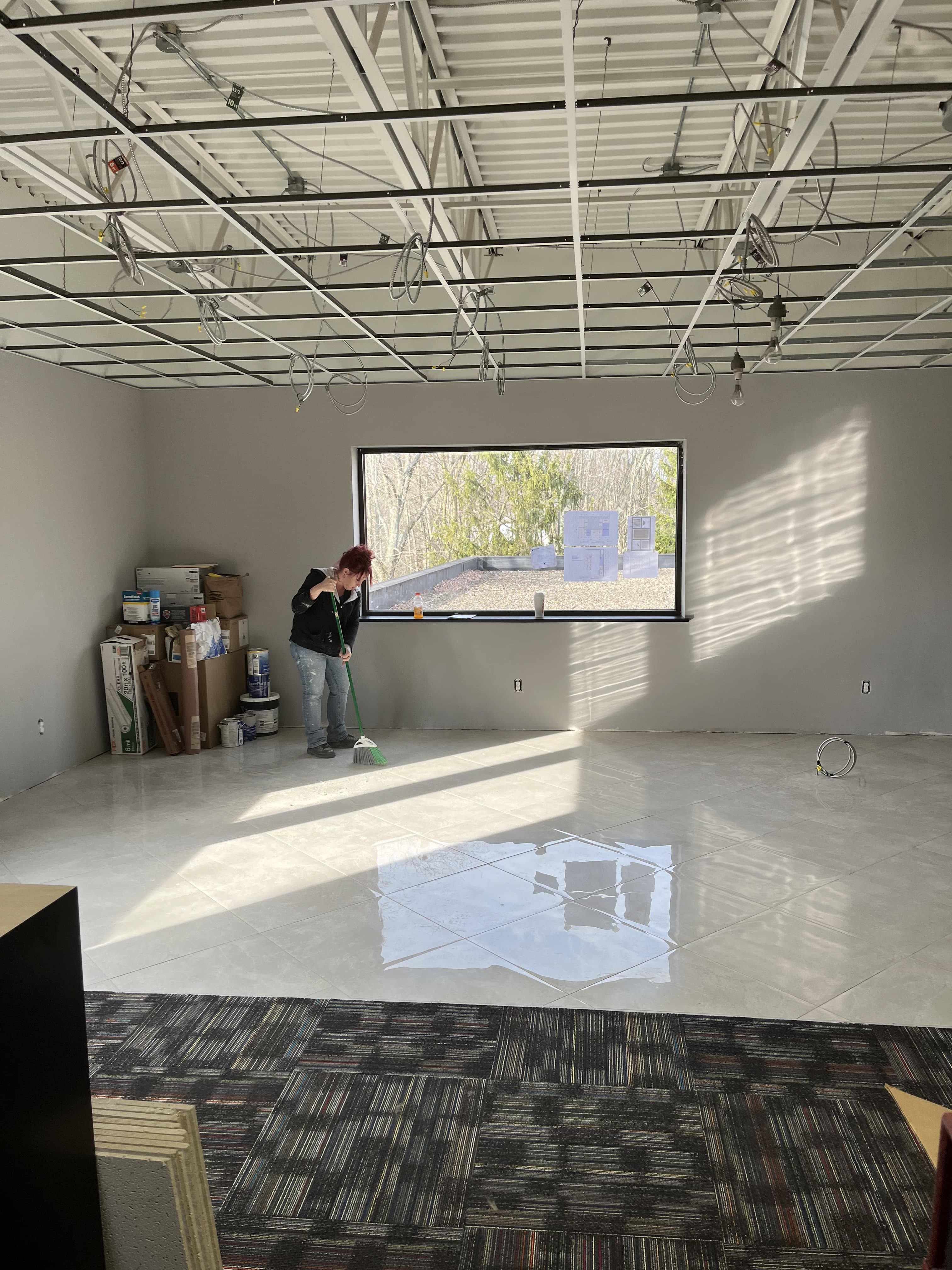 Finished commercial interior with polished tile floor and clean walls.