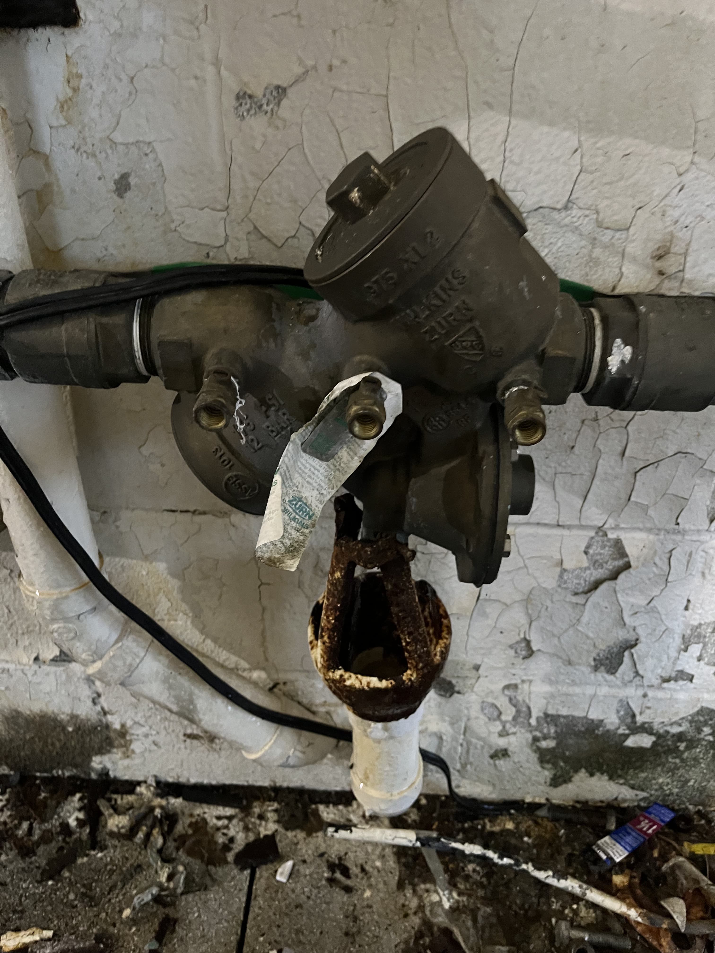 Close-up of utility service hardware during repair work.