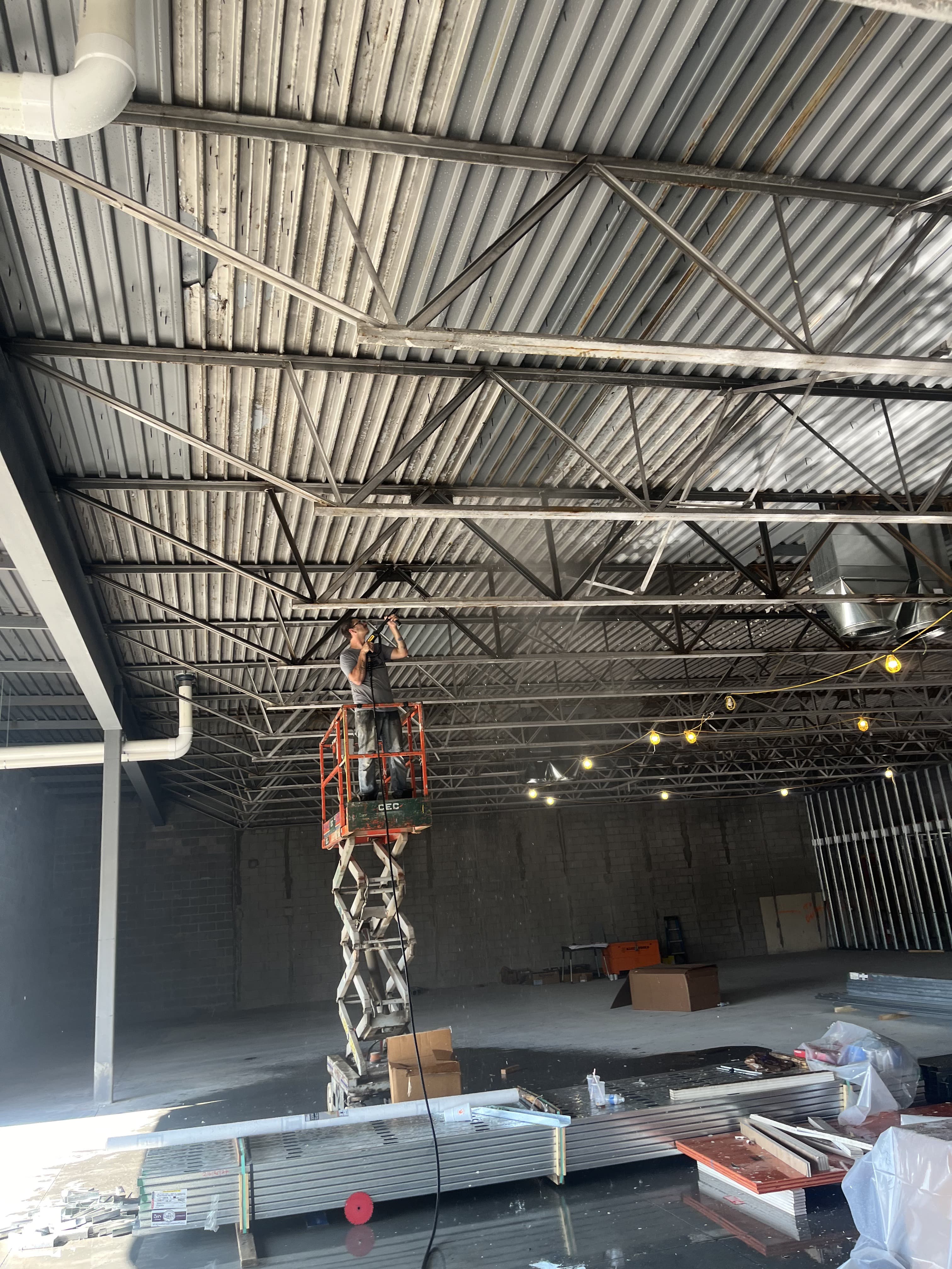 Open commercial bay during active renovation work.