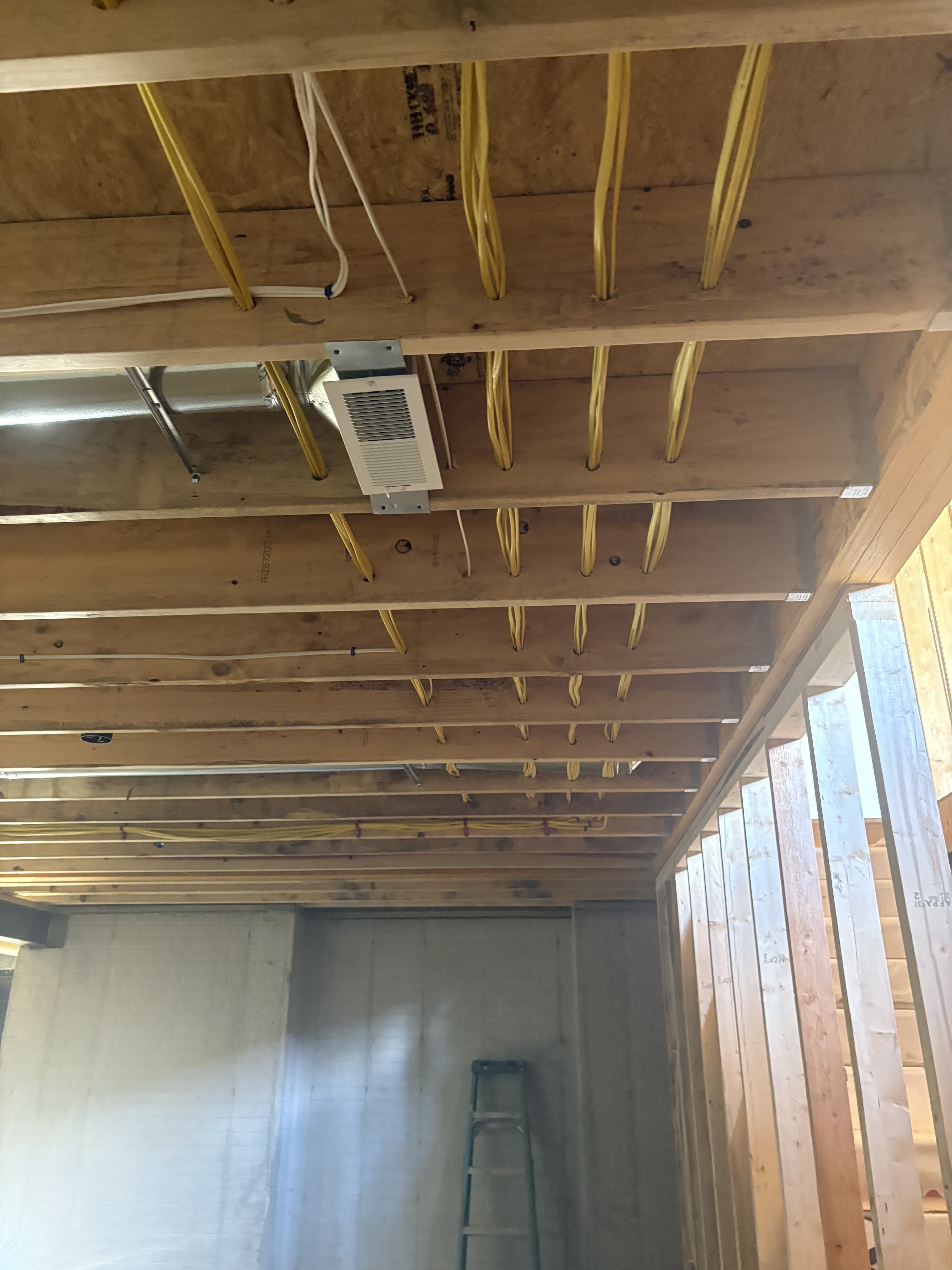 Open ceiling rough-in area during commercial build-out.