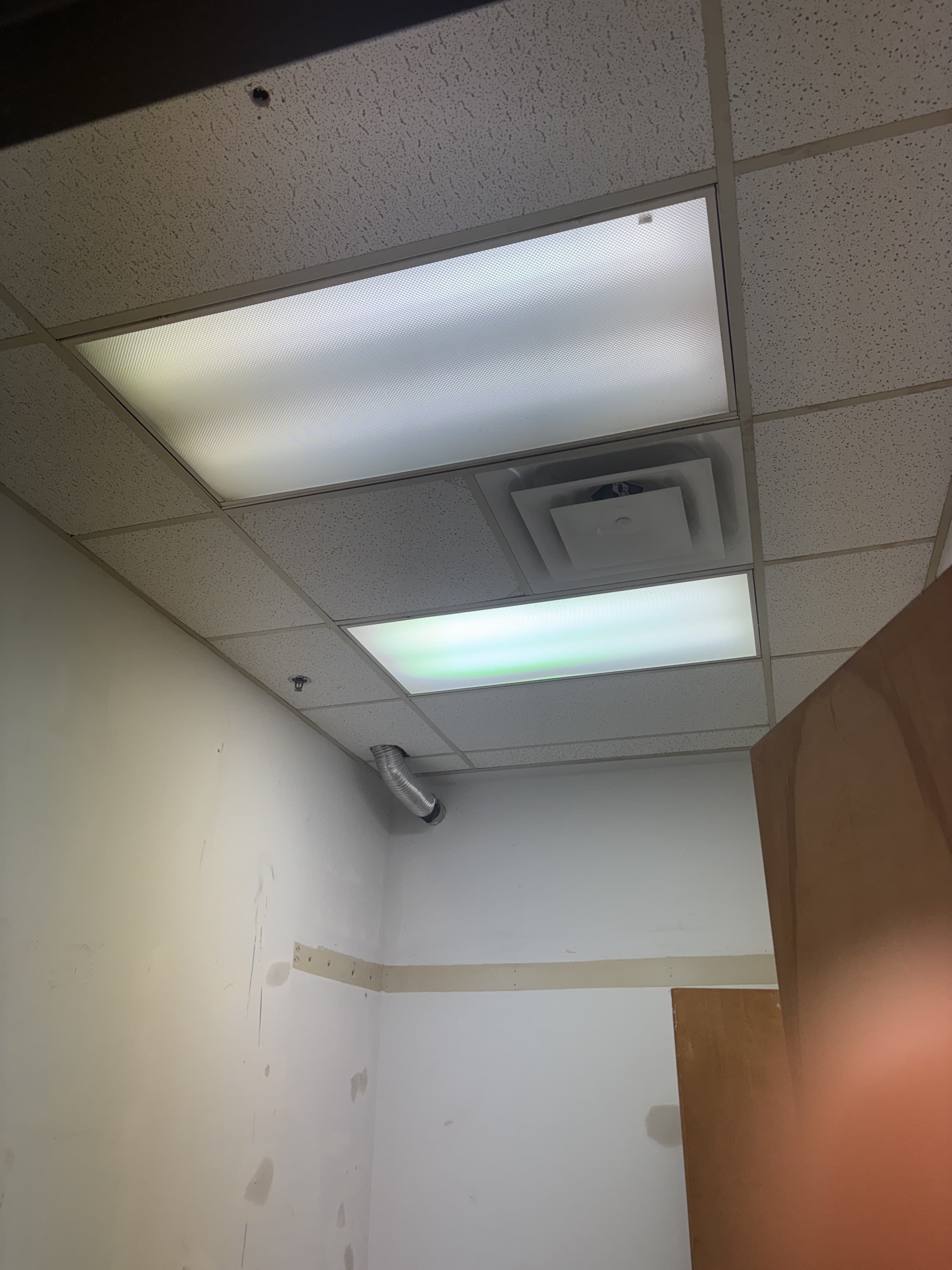 Office ceiling detail with lights and vent registers.